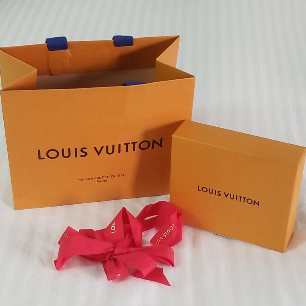 Louis Vuitton box, bag and bow